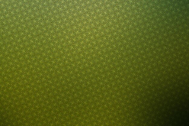 Green abstract background with some soft shades and highlights on it and a pattern