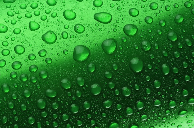 Green aluminum can with water drops or dew close-up