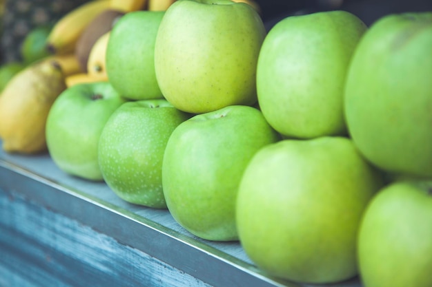 Green apple in street