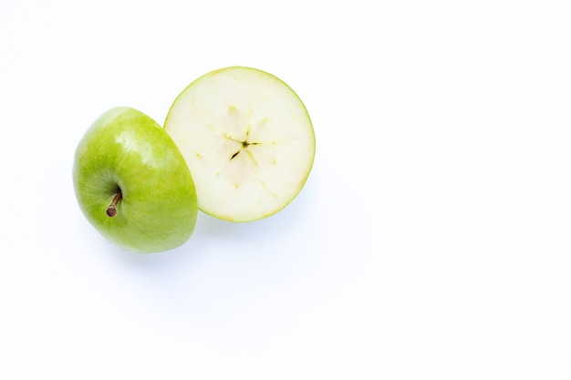 Green apple on white. Copy space