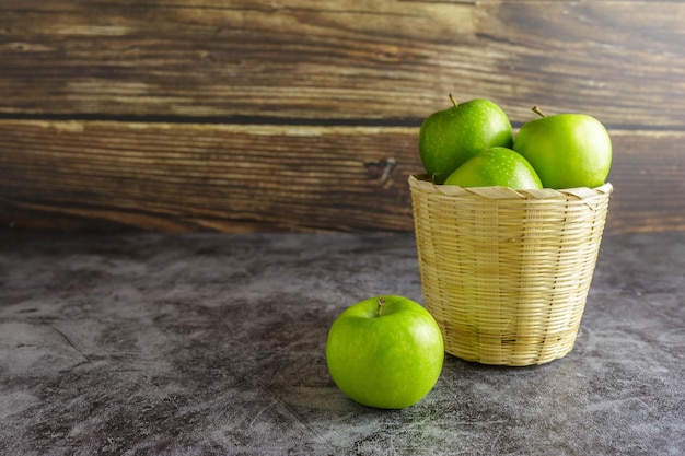 Green apples in a basket