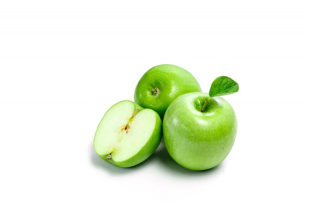 Green apples on a white , composition, isolate.