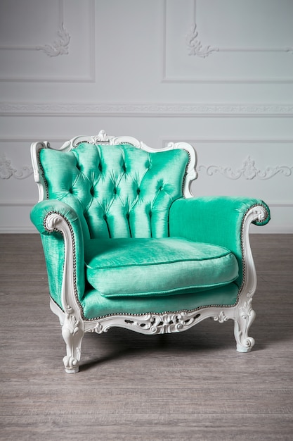 Green armchair in the room