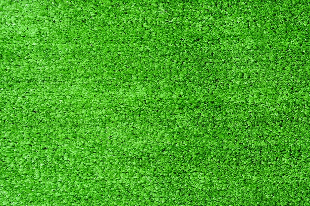Green artificial grass for texture background