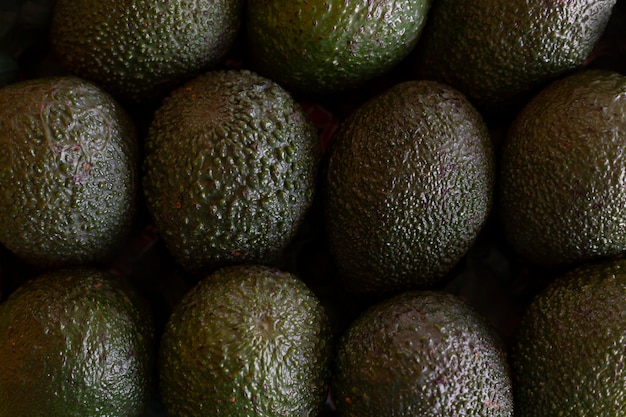 Green avocado vegetables table, top view, close up