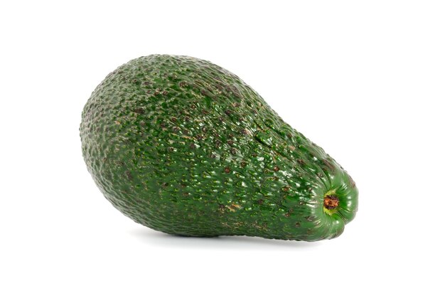 The green avocado on a white background