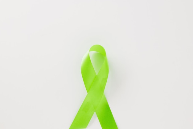 Green awareness ribbon of Gallbladder and Bile Duct Cancer month