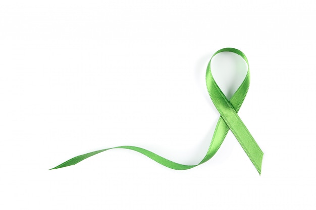 Photo green awareness ribbon isolated on white
