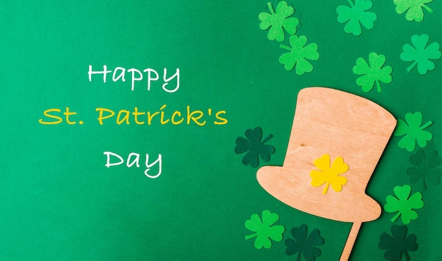 green background with a hat and shamrock on it