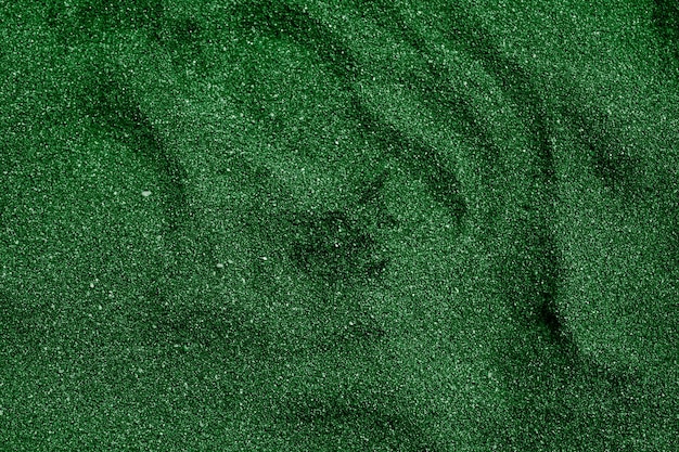 Green background with a pattern of white dots and a star.