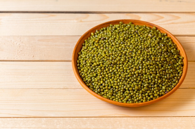 Green bean seed on table.