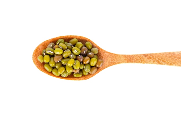 Green beans in a wooden spoon  