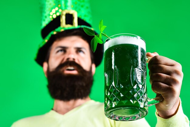 Green beer bearded leprechaun with green beer green men hat or\
top hat st patricks day ireland