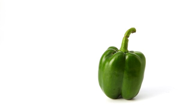 green bell pepper on white background