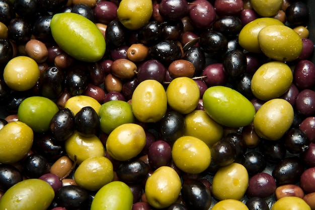 Green and black olives background