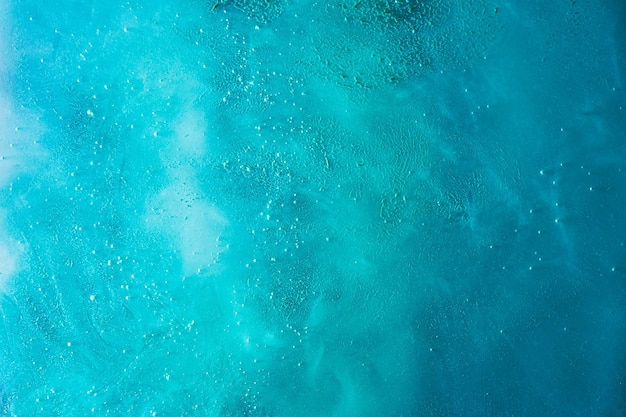 Foto verde blu astratto esopianeta spazio esterno mare vibrante onde schizzi e gocce di pittura ad acqua misteriose profondità esoteriche dell'oceano galattico