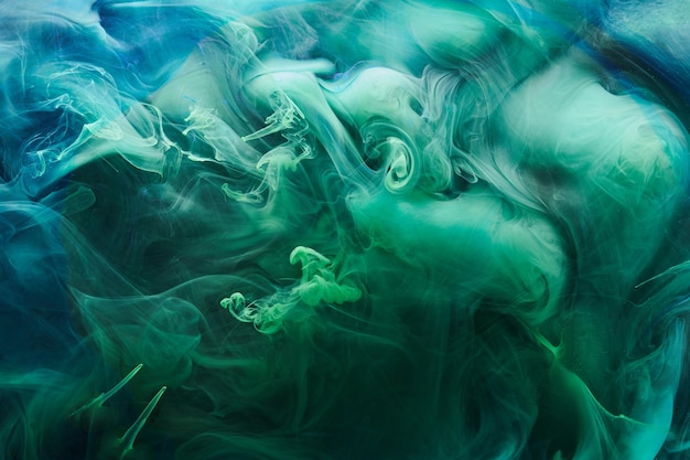 Green blue contrast liquid art background paint ink explosion abstract clouds of smoke mockup watercolor underwater