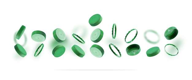 白い背景にリサイクルするための緑色のボトルキャップ空中に浮かぶプラスチック製のキャップ環境損傷からの安全性の概念環境の持続可能性の概念バナー