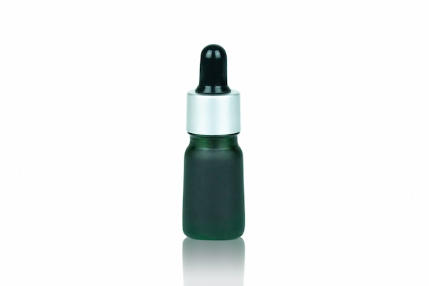 Green bottle dropper for contain liquid cannabis isolated on white