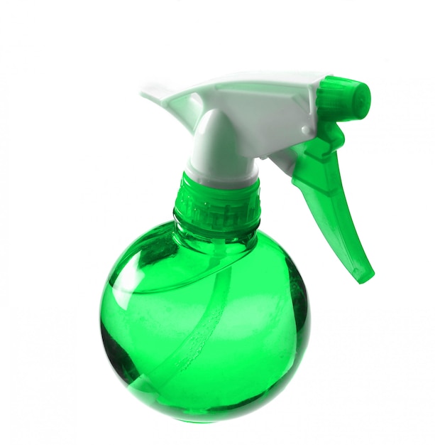 Green bottle of sprayer isolated on white background