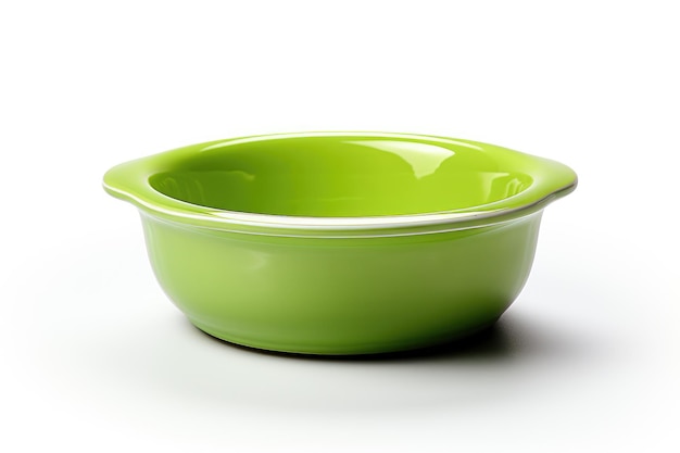 Green Bowl A green bowl sitting on a plain white background showcasing its simple design and vibrant color The bowl is round and shallow with a smooth surface