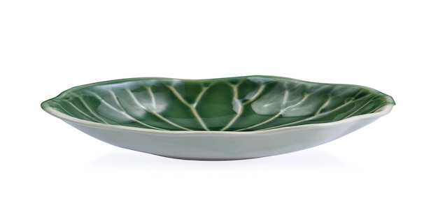 Green bowl on white surface