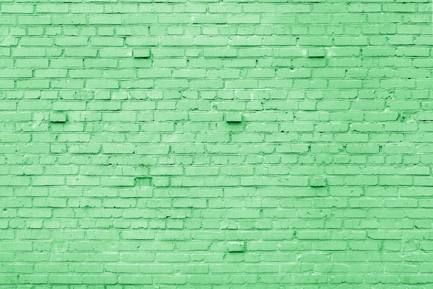 Green brick building wall. Interior of a modern loft. Background