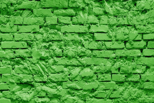 Green brick building wall 