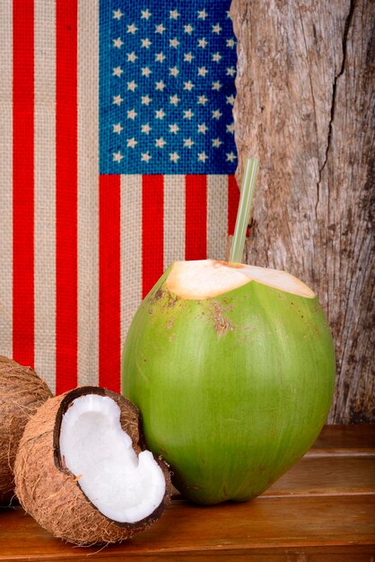 Green and Brown Coconuts with the United States Flag