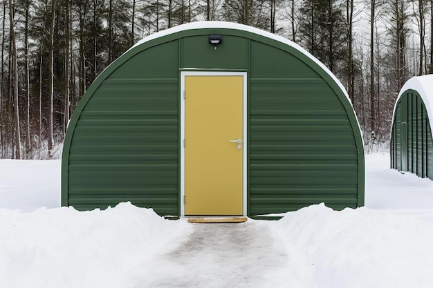 Photo a green building with a yellow door that says  snow