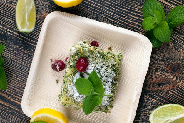 Green cake with cream and lime