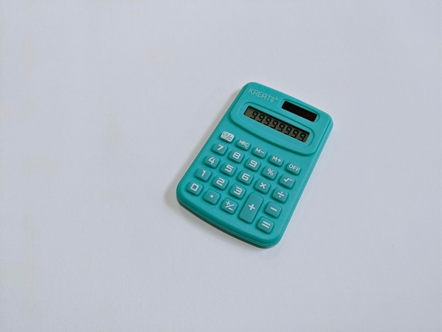 A green calculator on isolated background