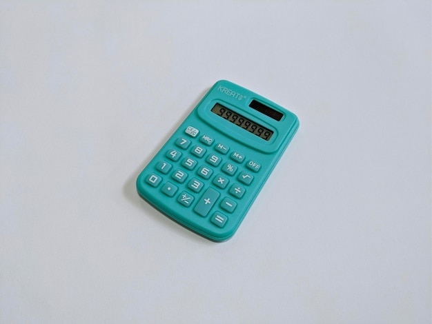 A green calculator on isolated background