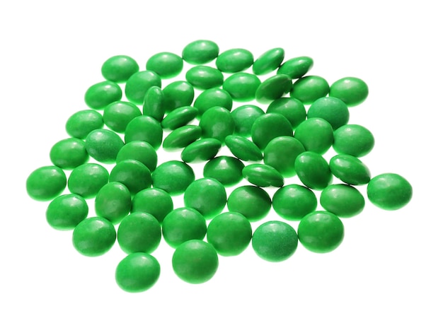 Green candies on white background