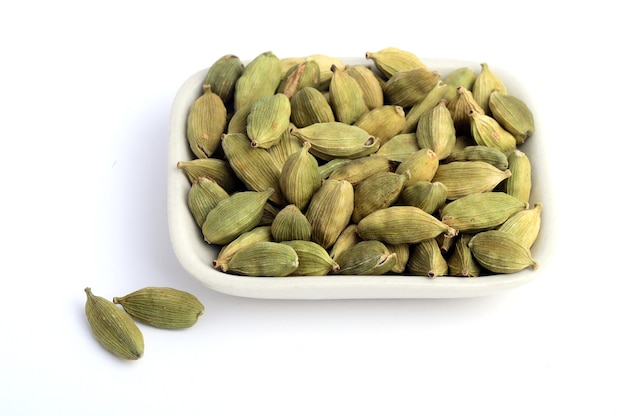 Green Cardamom pods in plate