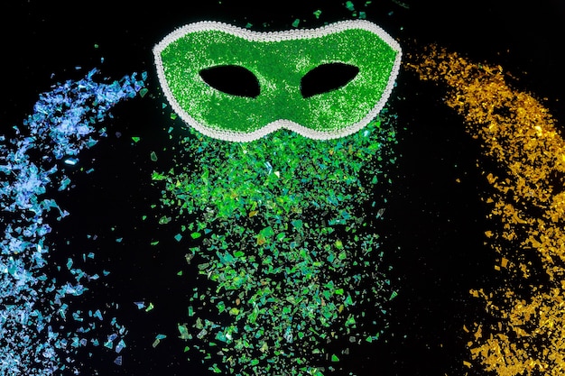 Photo green carnival mask for masquerade. jewish holiday purim.