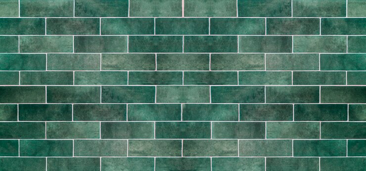 Green ceramic tile background. Old vintage ceramic tiles in green to decorate the kitchen or bathroom