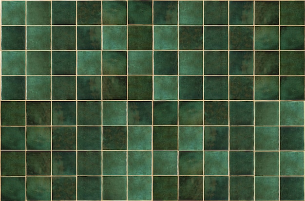 Фото Зеленая керамическая плитка фон старая винтажная керамическая плитка в зеленом цвете для украшения кухни