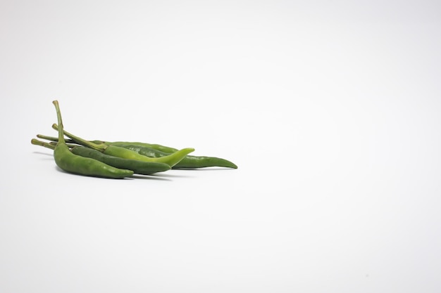 Green chili peppers isolated on white background Copy space Selective focus