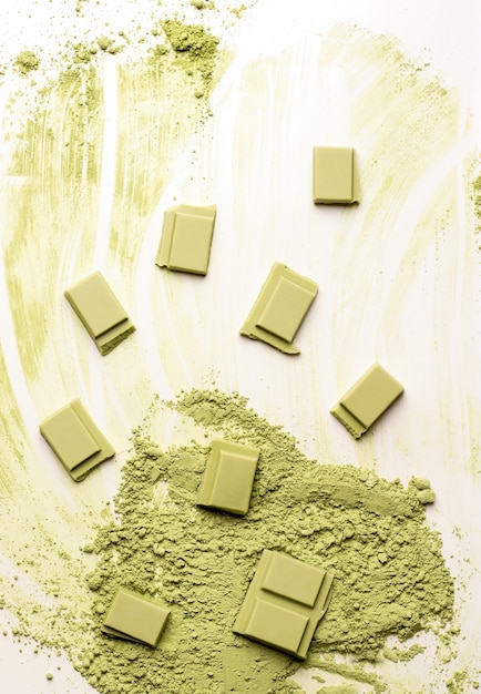Green chocolate with matcha tea on a white background. View from above