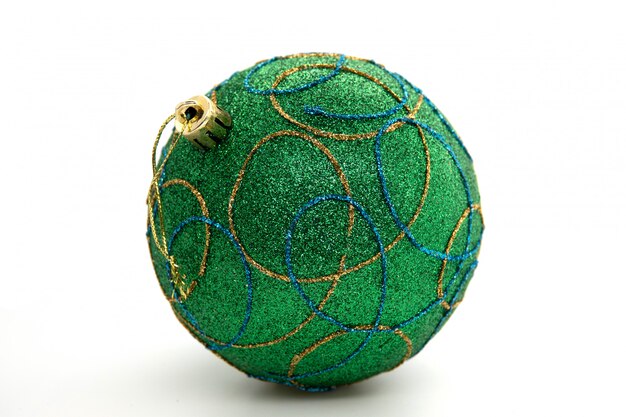 Green Christmas tree ball on white background