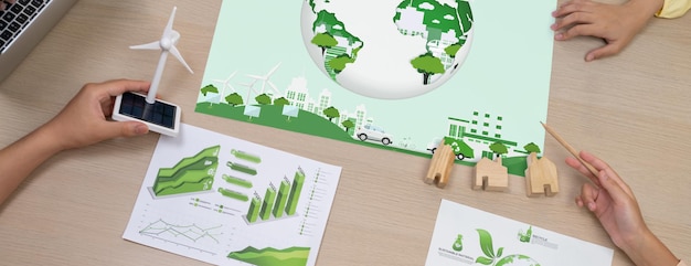 Photo green city poster was placed on business meeting table closeup delineation