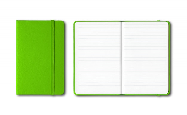 Photo green closed and open lined notebooks isolated on white