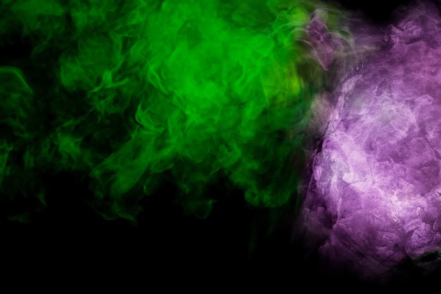 Green cloud of smoke on black background