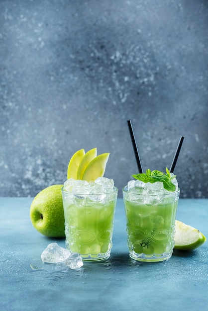 Green cocktail with ice and mint