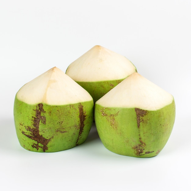 Green coconut on white background.