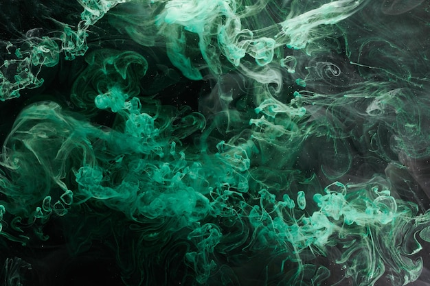 Green color abstract smoke background Mix alcohol ink creative liquid art mockup with copy space Acrylic paint waves underwater