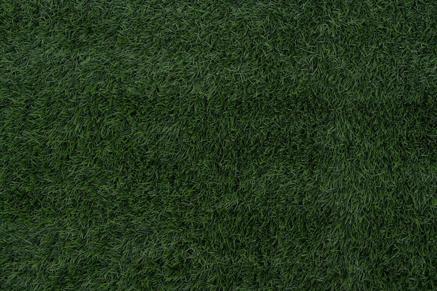 Photo green color fake grass texture background