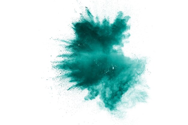 Photo green color powder explosion cloud isolated on white background.