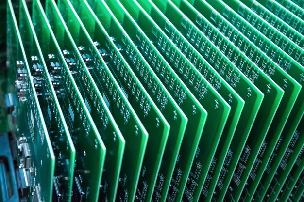 Green communication circuit board closeup in a server roomxA